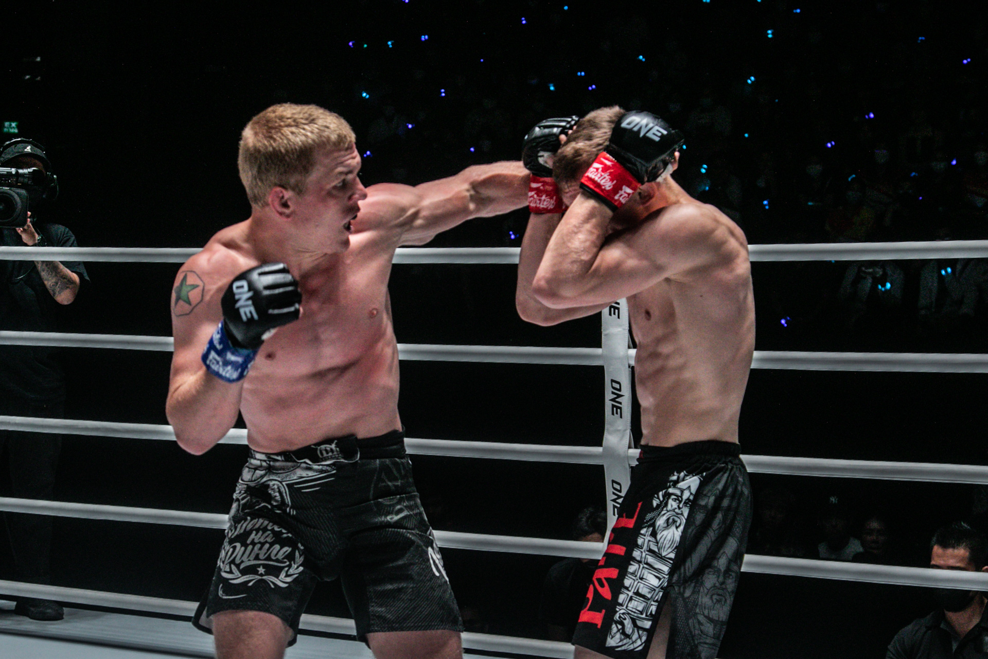 Dmitriy Babkin takes a punch from Ivan Parshikov at ONE Fight Night 3