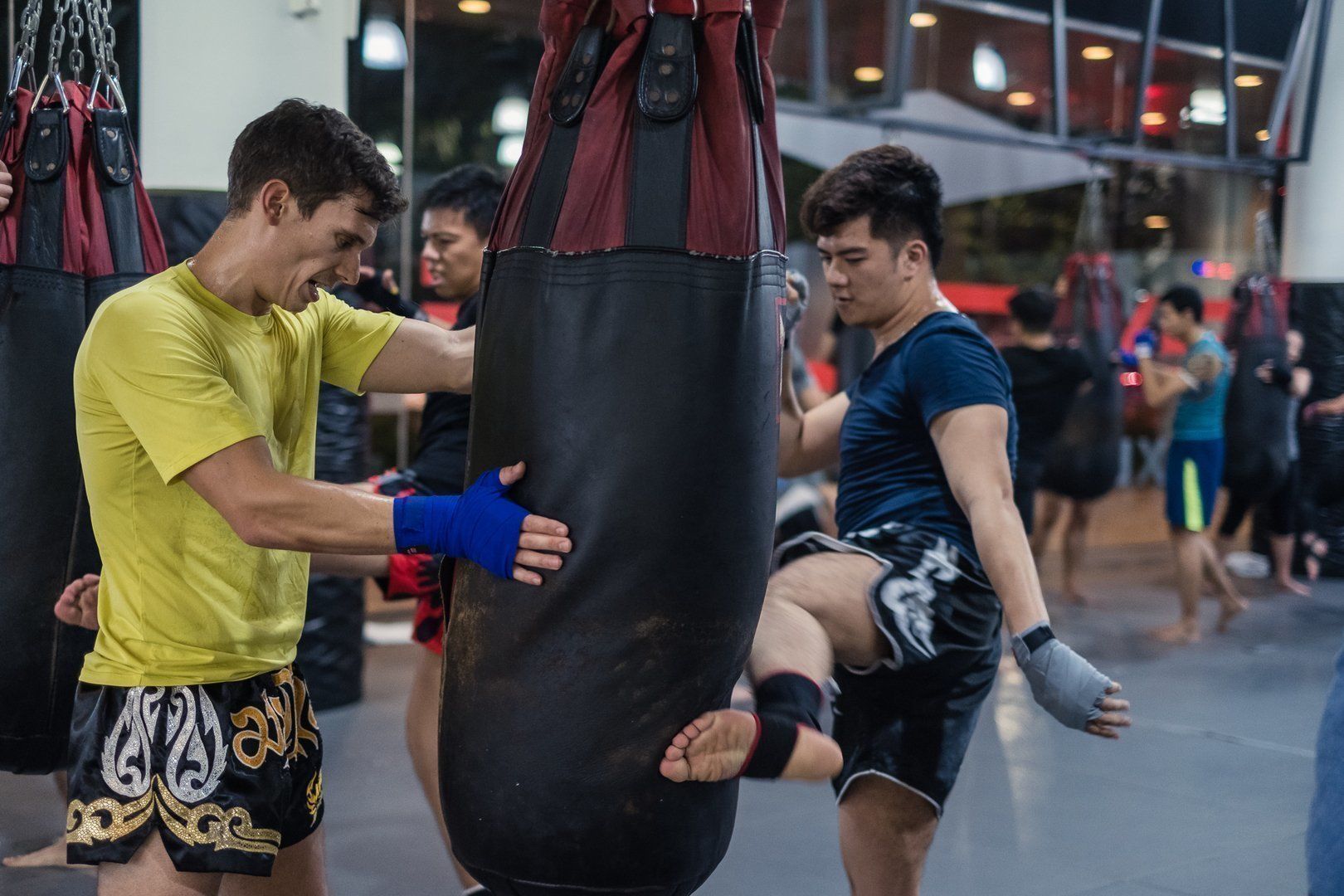 Two friends train Muay Thai at Evolve